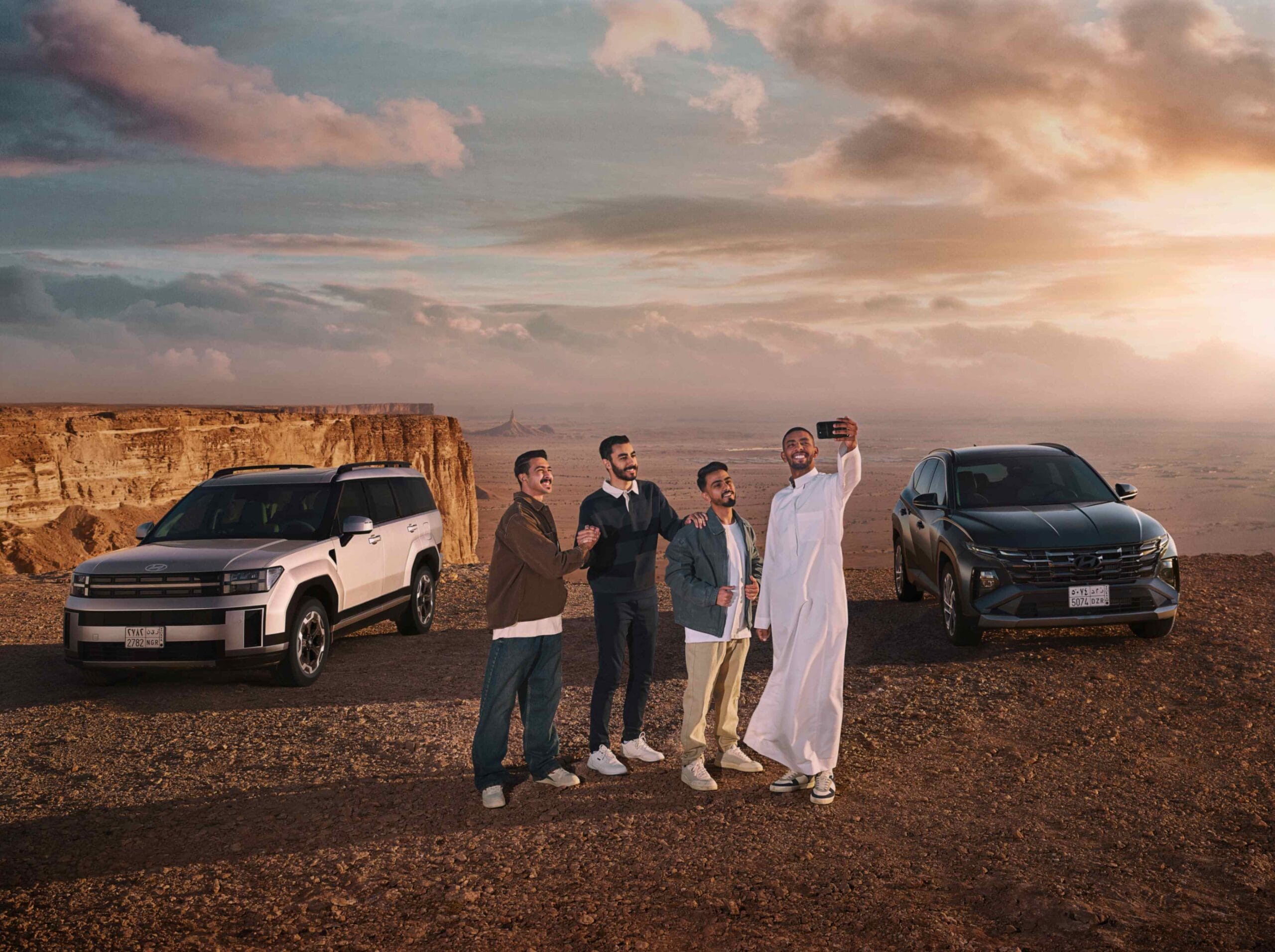 Hyundai Santa Fe and Tucson automotive campaign key visual photographed in the Saudi Arabian desert
