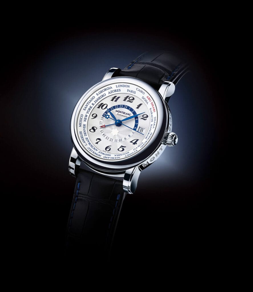 Montblanc world-time luxury watch photographed against a dark studio background.