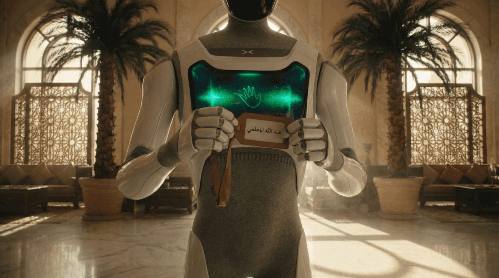 Humanoid service robot holding a guest name card in a luxury hotel, from the Abu Dhabi Robotics AI brand film.