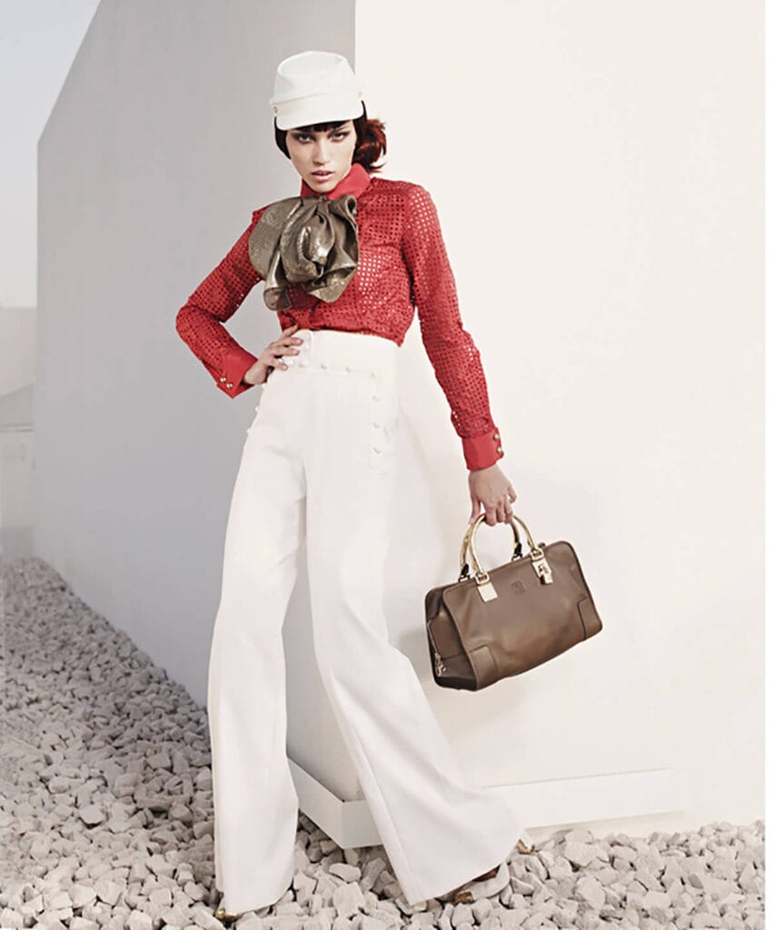 Luxury fashion editorial campaign photographed with refined styling and cinematic lighting.