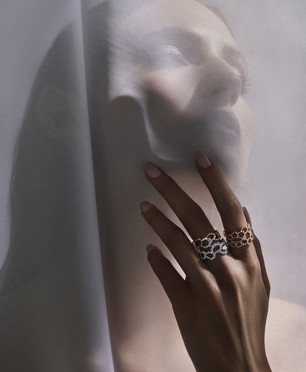 Luxury jewellery editorial featuring a styled collection of statement rings.